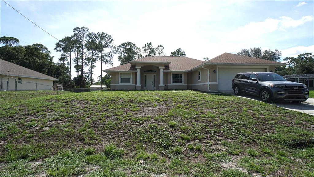 Located in a quiet area of Lehigh Acres, this 3-bedroom, 2-bath home offers approximately 1,850 square feet of living space with a two-car garage and is situated on an approximately one-half acre lot. The spacious homesite provides room for outdoor living, recreation, or future enhancements while enjoying the privacy and space that larger lots provide.

The property is in need of significant repairs and renovations. Based on available information, the home has experienced floor settlement, and buyers should anticipate completing substantial improvements. This property is best suited for buyers prepared to undertake a major rehabilitation project. Thorough inspections by qualified professionals are strongly encouraged to determine the condition of the structure, systems, and all improvements.

Conveniently located with access to shopping, dining, schools, and other area amenities, this property presents an opportunity to restore and customize a home in an established neighborhood.

This property is being offered as a short sale. Buyers and agents should review all MLS supplements and private remarks for important information regarding the purchase process.

Buyers should verify all information.

Agents: Please review all private remarks and MLS supplements prior to scheduling a showing.