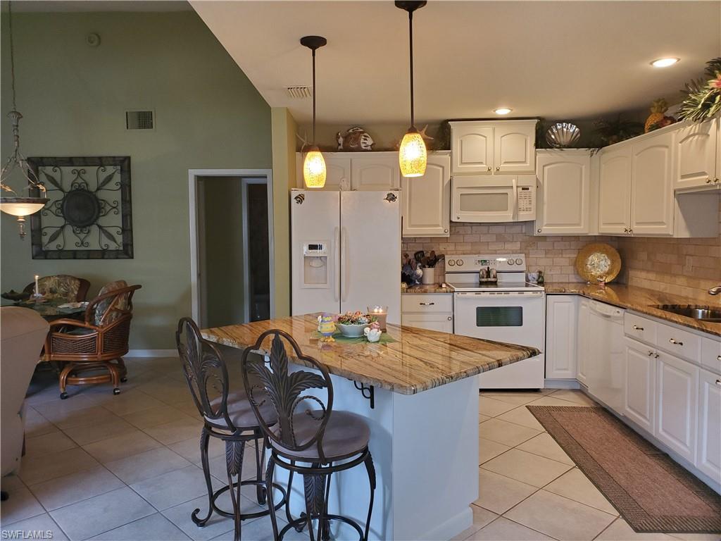 Attached Villa in Myerlee Gardens Condos.Condo Fee $305 per month. Corner Unit with Updated open kitchen with granite countertops & granite countertop island. Vaulted Ceiling Living Room, Large Master Bedroom. In House Laundry. Large Florida Style Enclosed Lanai/Patio. This spacious Villa is perfect for Year Round Living or your Florida Winter Home.The Myerlee Community surrounds the Myerlee Golf Course a Private/Public Course.55+ community with Amenities such as Club House, Large Pool & Spa, Tennis Shuffleboard, Fitness. Library, Sidewalks and Lots of Community Activities Like Theater Yoga Golf Picnics Water Aerobics. Close to Ft Myers Beach & Sanibel. Quick Access to the Airport, Lots of Dining Opportunities and Shopping Galore! This Villa has been impeccably maintained and updated. Wonderful Community. Perfect Location for Quick Access in and Out of Myerlee Gardens. The Villa is being sold AS-IS completly furnished. This is a great opprtunity for a vacation home!