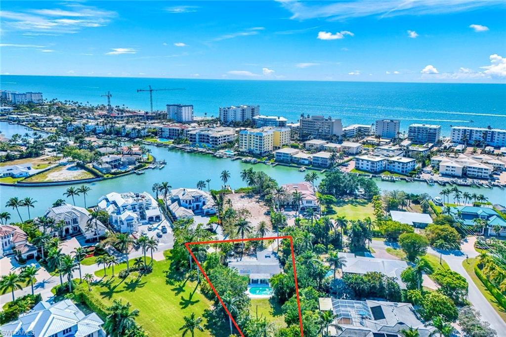 Located west of Crayton Road on one of the southernmost streets in the Moorings, 289 Spring Line Drive is the largest non-combined property available, offering .58 acres.  With almost 160 feet of frontage, any new development has a wide variety of options to build a unique estate not possible on normal properties such as a hidden side-loading garage, attached cabana and more.  Additionally, the large lot size allows for an approximately 6,600 square foot single story residence, or an over 10,000 square foot two story residence.  Spring Line Drive is a secluded, low-traffic street, perfectly positioned in the Moorings and conveniently located to all of downtown Naples.  Only a short walk away, the Moorings Beach Park, a private beachfront retreat featuring pristine white sands and calm Gulf waters without the crowds of public beaches, is available through membership of the Moorings Property Owners Association.