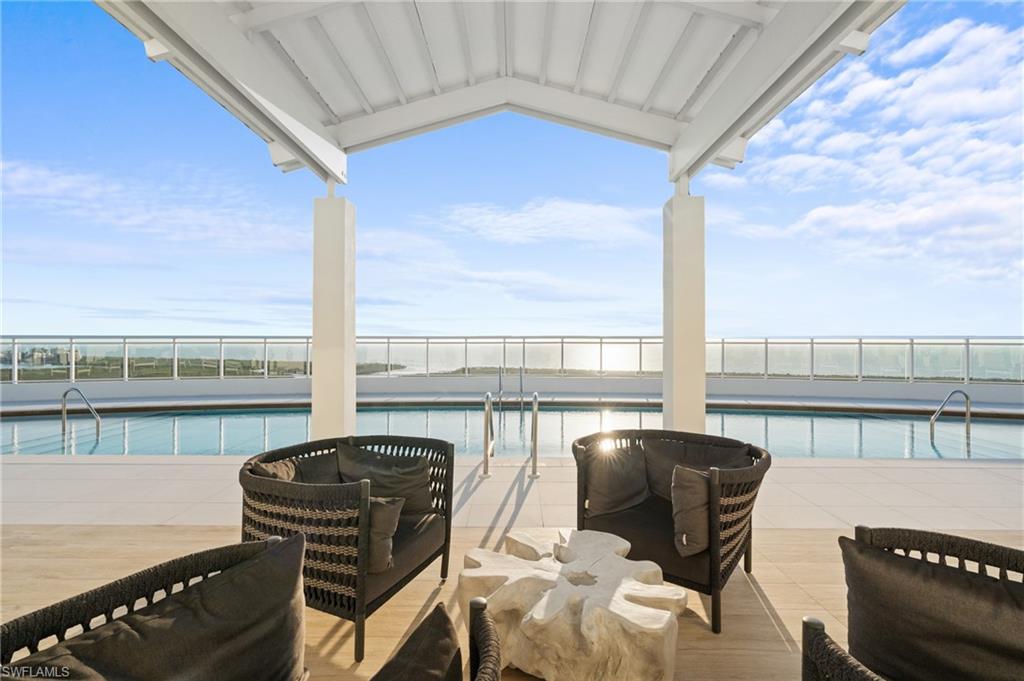 Luxury Living at its Finest! Immerse yourself in the epitome of elegance with this exquisite condo nestled within the prestigious neighborhood of Kalea Bay. This opulent residence offers an unrivaled lifestyle that will captivate even the most discerning homebuyer. Step inside and prepare to be mesmerized by the stunning floor-to-ceiling windows allowing natural light to flood the interior. This professionally designed masterpiece boasts a sleek and chic aesthetic, enticing you to embrace a life of sophistication and style. A true chef's kitchen with an oversized island complete with quartz countertops and top-of-the-line Wolf & Subzero appliances elevate the cooking experience. Indulge in the ultimate relaxation by taking advantage of the recently completed multi-million dollar wellness center. With resort-style pools, restaurants & fitness center, you have all the amenities needed to achieve optimal well-being. Entertain guests in your stunning social room, or simply bask in the serenity of the surroundings as you take in the amazing views that stretch as far as the eye can see. This move-in ready beauty is perfect for those seeking a seamless transition into their dream home.