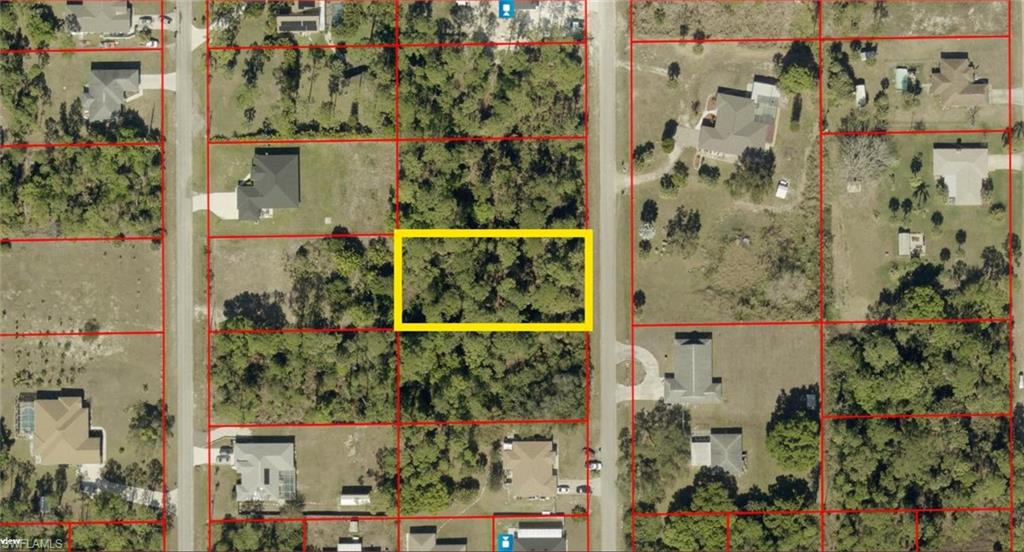 This is your chance to get in on the ground floor of up and coming Lehigh acres. Just minutes to public transportation, shopping, mini golf and groceries this property's location is ideal for anyone looking to mae a long term investment, build their custom AirBnB for near-future income, or forever slice of SWFL paradise for a still affordable price. Both lots on either side are still wooded and vacant affording both privacy and the ability to stretch out. Don't miss out on this one!