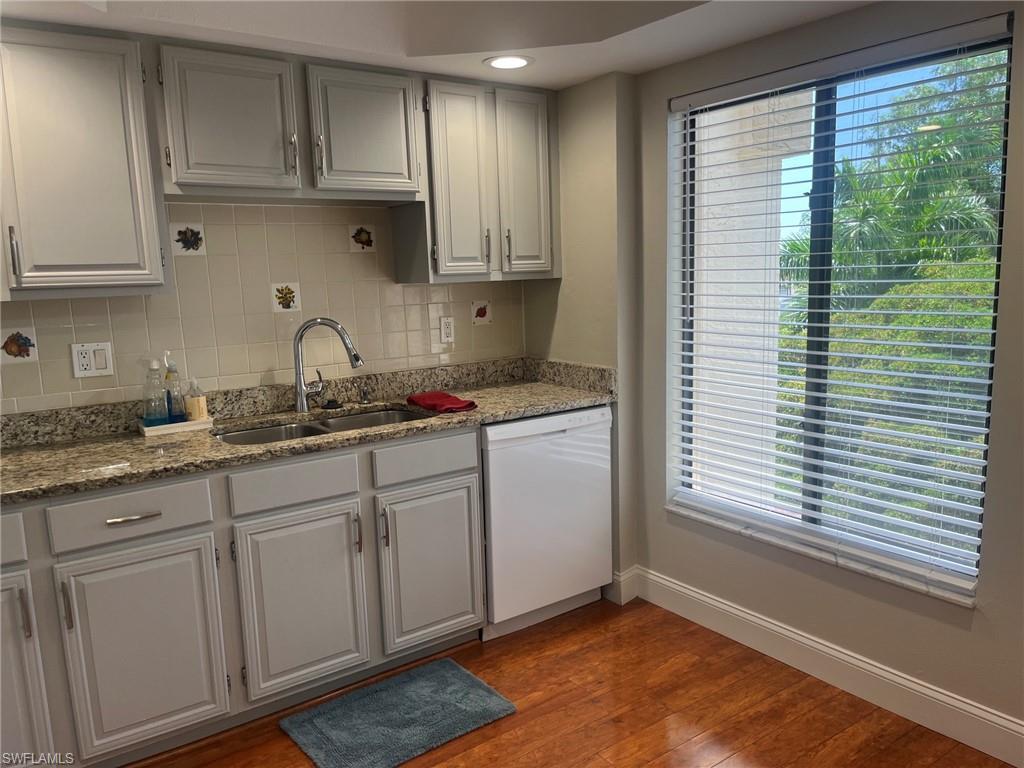 Welcome to Seven Lakes Golf and Tennis Community.... Make this condo your next home, this condo is on the top floor for expansive views of the 6th pool in the community and the golf course.  The unit has newer luxury vinyl flooring in the main living area. The two bedrooms are carpet.  The primary bedroom has an ensuite bathroom with a walk-in shower and walk in closet.  Next to the kitchen is a laundry room with a full-size washer and dryer.  The unit has been painted and is ready for a new tenant.  Seven Lakes is an active 55+ community where one tenant needs to be 55 years of age.  Seven Lakes offers tenants Golf, Tennis, Pickle Ball, Basketball; Six Heated Pools to enjoy and relax, along with Bocce Ball, Shuffleboard and a variety of card game, billiards, auditorium that host entertainment and dinners and dances, bingo and trivia too.  We are a 24-hour guard gated community.  Centrally located close to restaurants, shopping, beaches and more.  Come and enjoy all that we have to offer.