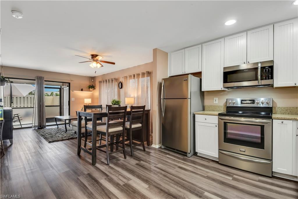 BACK ON THE MARKET! Buyer financing fell through. Renovated villa w/ fantastic Bonita Springs location! Enjoy low-maintenance SWFL living while being situated just North of Bonita Beach Rd giving you easy access to I-75, US41, and best of all less than 5 miles from the beautiful white sand beach that lines the Gulf of Mexico.  Meticulously cared for home and tastefully updated w/ high-end luxury vinyl flooring throughout (still under warranty), new tile and privacy screens in the lanai, open concept kitchen w/ cottage style cabinets, quartz counter tops & stainless steel appliances, renovated bath w/ granite counter top, and new fans & light fixtures. The outdoor living space gives you a wonderful place to relax or entertain- it is a completely private setting that has enough room for grill station, outdoor dining set, and lounging chairs. There is an additional storage room off of the open lanai and each unit is assigned 1 parking spot sticker and 1 secondary sticker. Located in a non-gated deeded community that offers a community pool and has very affordable condo dues. New roof in 2018.