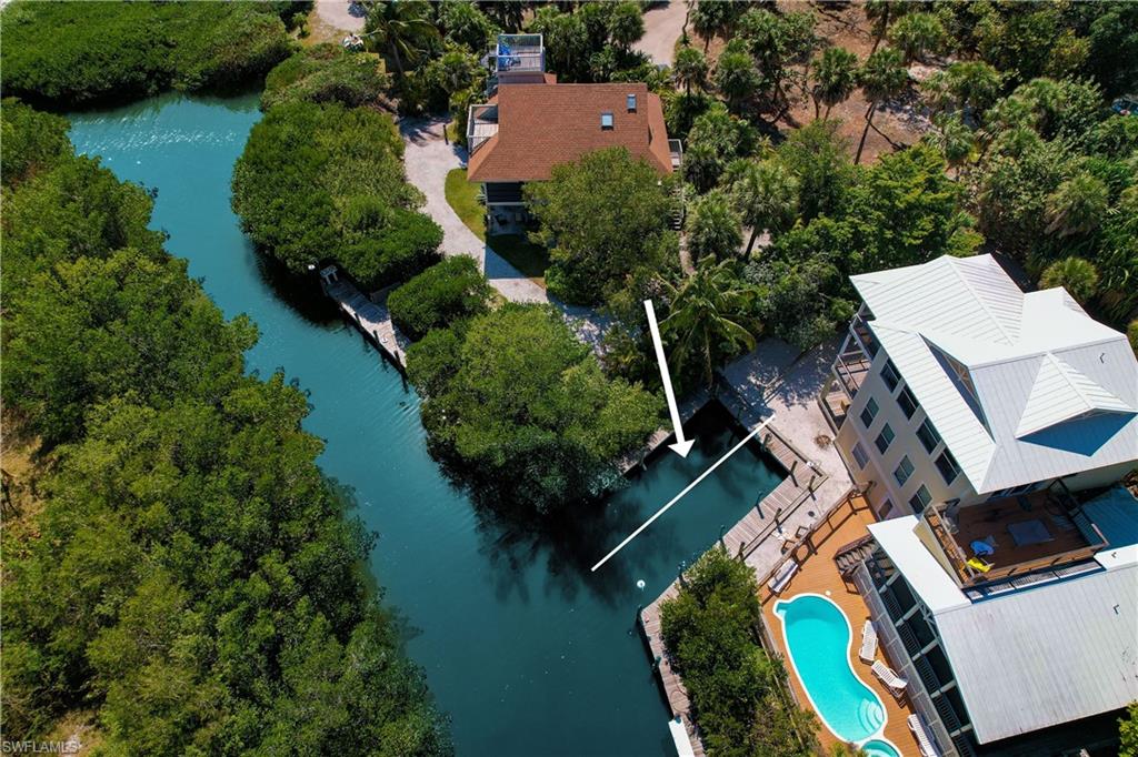 EXTREMELY RARE dock parcel and easement on North Captiva Island with 32' dock slip.  Most docks on the island are 20' with a few that are 25', so a slip like this is almost impossible to find.  If you have a larger boat and want to own your own full dock without time limits, dues or sharing and not buying an expensive waterfront property, this is your best option.   Don't miss it!