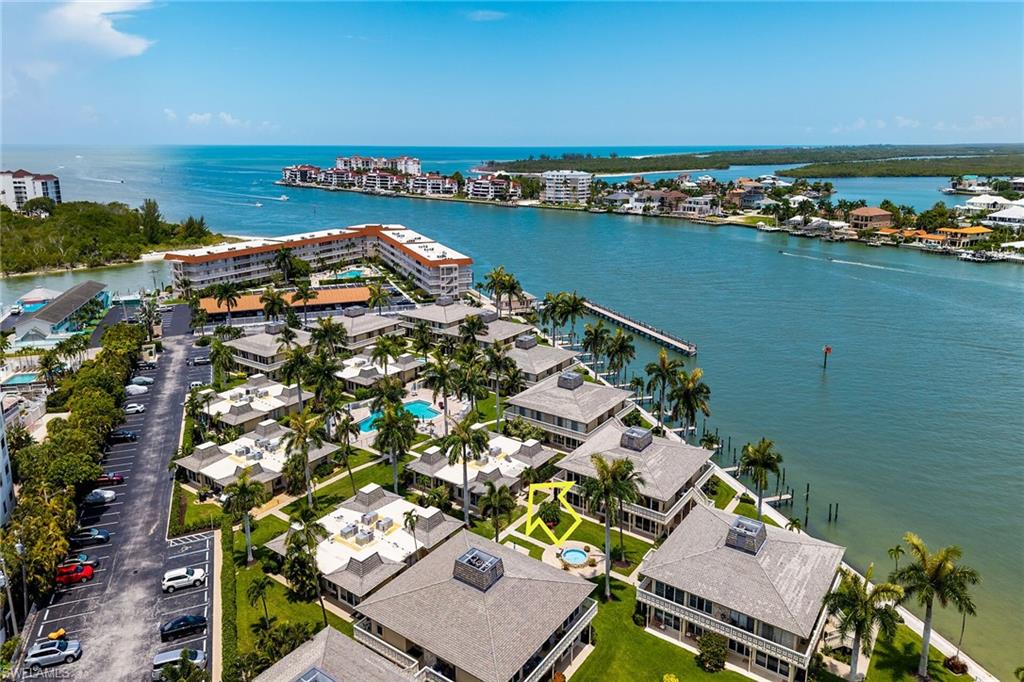 Welcome to your slice of paradise! This beautifully remodeled first-floor coastal retreat offers the perfect blend of style, comfort, and island living. Bright and airy throughout, this immaculate 1-bedroom, 1-bath residence is ideally situated just steps from the Marco River and the community pool. Designed with modern elegance in mind, the condo features tile flooring throughout, quartz countertops, stainless steel appliances, and an updated bathroom. Hurricane-impact windows and sliding glass doors provide peace of mind. Being offered furnished, this move-in-ready gem allows you to start enjoying the island lifestyle from day one. Relax on your private lanai and take in serene Marco River views or stroll to the nearby pool for a refreshing swim. Boating enthusiasts will appreciate the potential availability of dock leases. Perfectly located near popular waterfront restaurants, boutique shopping, and Marco Island's world-famous white-sand beaches, this exceptional property offers the best of Southwest Florida living. Whether you're seeking a seasonal getaway, investment opportunity, or full-time residence, this waterfront retreat is ready to make your own!