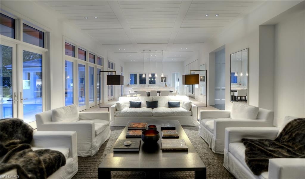 Three and Half Blocks to the Beach.Just completed.This impressive sleek, contemporary home is a designer’s dream.Custom-built ONE STORY residence  offers 4,276SF of inspired living:four bedrooms including a master suite; private Cabana/Guest suite with private bath with designated exterior entrance are additional features that set this home apart from the rest ,two additional guest suites with private baths;a study/bonus guest room,one half baths;preferred Western Exposure; four car garage; one of a kind lot 0.55 Acres; X zone location-no flood insurance required.The gourmet kitchen is appointed with custom solid wood white shaker cabinetry;Sub-Zero® refrigerator;Wine Fridge ;Wolf® convection cook top ,butler’s pantry;Bosch® dishwasher;Wolf built in Capucino Maker;exotic quartz countertops. The master suite and spacious master bath are flooded with natural light and feature a relaxing coastal palette,vanity,soaking tub,large shower,and walk in closets. Additional features include: Ceiling Treatments - Coffered, Wood ;custom made 11 ‘doors; custom heated pool and spa ; French oak wide plank flooring; mature landscape.This home provides the ultimate in design.Agents see remarks