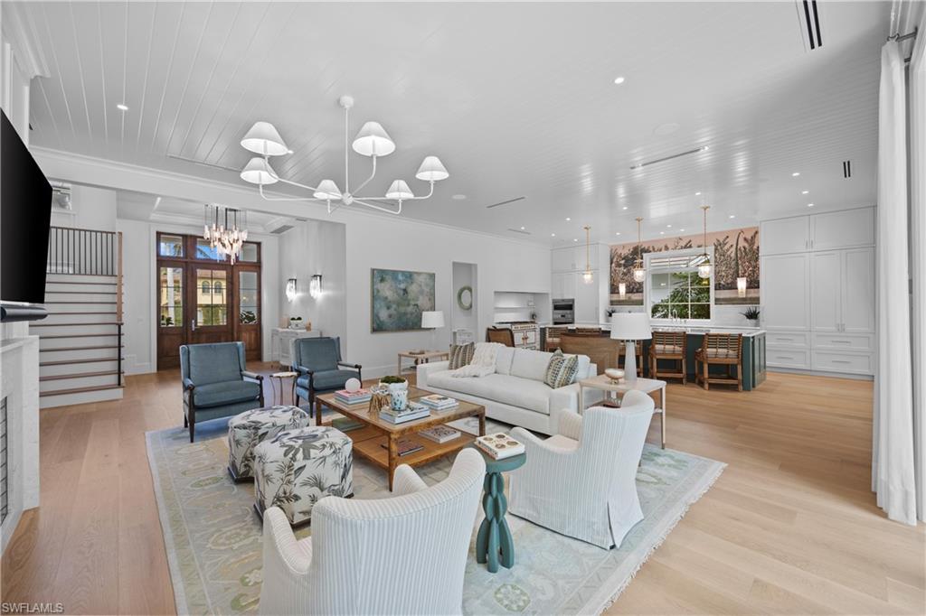 Introducing a Luxurious Beach Retreat in Port Royal. Experience the epitome of Old Florida charm in this newly constructed masterpiece just steps from the pristine sands of Port Royal. From the moment you pull up to the 3 car garages to ascending the stairs to the front door you will truly fall in love. Impeccably finished and thoughtfully furnished, this residence boasts unparalleled craftsmanship from hand-painted murals, custom cabinetry, and Legno Bastone French Oak flooring to exude timeless elegance. Spacious and Inviting with 7 bedrooms, a welcoming living room, a cozy upstairs family room, and expansive outdoor living spaces with a large pool and spa that provide ample room for family and guests.  Indoor-Outdoor Living provided by the Anderson accordion wood doors seamlessly connecting the interior with the outdoors, creating a harmonious flow. State-of-the-Art technology fully automated with a HomeWorks Lutron system, integrated Sonos sound individual zoned throughout for ultimate convenience and comfort. Enhanced security in the outdoor living areas which can be fully enclosed remote controlled drop-down screens or shutters. Your new home provides exclusive enjoyment in the coveted lifestyle of Port Royal and is associate member eligible. This is the perfect opportunity to own a truly exceptional property in one of Florida's most prestigious coastal communities. Schedule your private viewing today and experience the magic of this home!
For the boating enthusiast, there are many options: Naples Yacht Club, Hamilton Harbor, Cove Lane Boat Houses and Cove Inn Docks