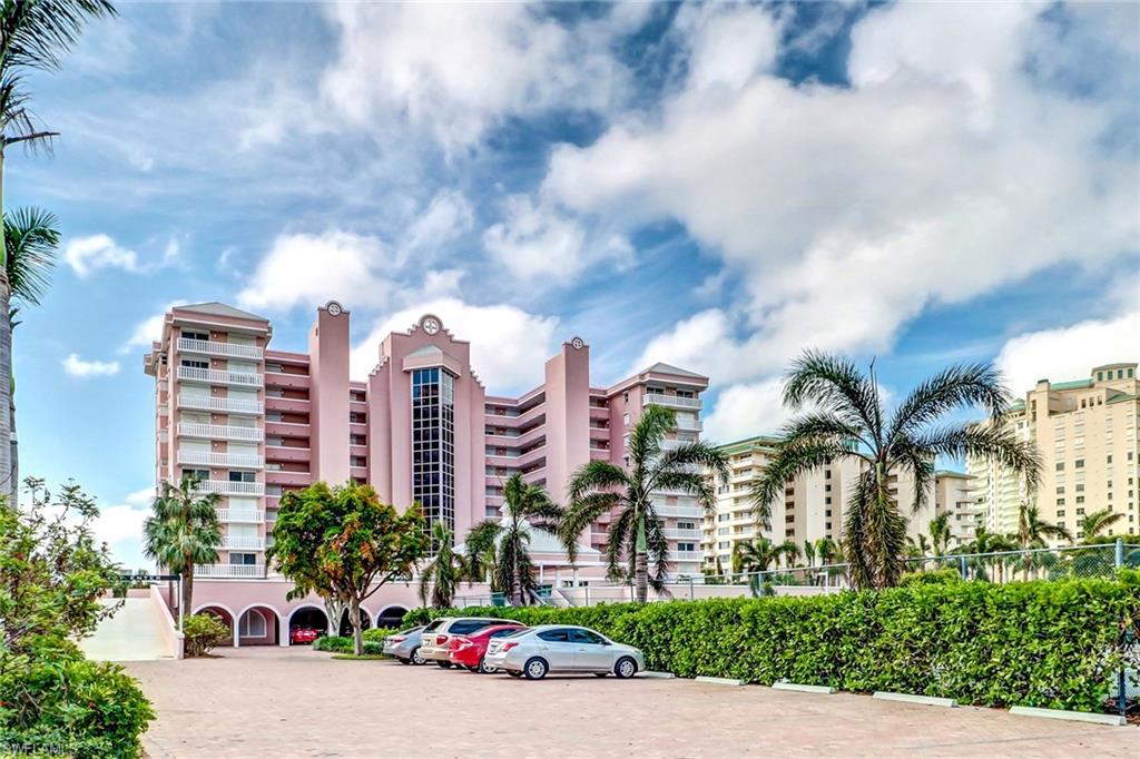 Enjoy magnificent views of the Gulf of Mexico & ten thousand Islands. You will appreciate the glorious sunrises from this charming light and bright 3 bedroom and 2 bath residence. This unit has it's very own staircase to the water and dock! Only certain units have this feature ! Brand new Air Conditioning system just installed. This is a well maintained unit that has windows everywhere to allow the sunlight in and city lights at night. Gated and electric shutters. Enjoy a The Planation's social activities, Tennis, pickle ball, fitness center and social room. Private fishing pier plus private beach next to heated pool. Walking distance to our famous Crescent Beach.