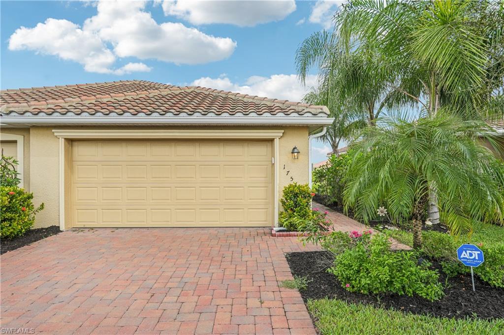 Available for annual rent — move-in ready now in Orange Blossom Ranch! Live the resort lifestyle in this bright and stylish 2-bedroom + den, 2-bath attached villa located in the highly sought-after gated community of Orange Blossom Ranch. Designed for comfortable, low-maintenance living, this home features an open-concept layout, white shaker cabinetry, granite countertops, and updated lighting that gives the space a fresh, modern feel. The spacious primary suite offers dual vanities, a walk-in closet, and sliding glass doors to the screened lanai. A versatile den provides the perfect flex space for a home office, guest room, or hobby area. An attached two-car garage adds everyday convenience. Enjoy access to exceptional community amenities, including two resort-style pools and spas, a fitness center, tennis courts, basketball and volleyball courts, and playgrounds. Ideally located near dining, shopping, healthcare, the Collier County Fairgrounds, Regional Park, and Aquatic Center, all within a highly regarded school district. Now available! schedule your showing and secure your place in one of Naples’ fastest-growing communities.