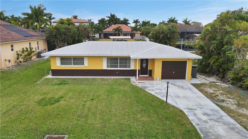 Direct Sailboat Access... Instant Deep Water Access in Minutes!!! This property has the highly sought after Southern Exposure for most year- round sunlight for your pool area and patio. Located a few homes off of the Bimini Canal for deep sailboat access, the Christmas Boat Parade route and the future Bimini Basin project. So close to the River you can feel the breeze off the water, seagulls, and truly feel the Florida Sunshine! Live in the home or rent it out until your new home plans are ready. Several multi-million dollar new homes throughout the neighborhood, across the canal, and currently being built next door. Conveniently located near Tarpon Point Marina for several waterfront restaurants, shopping, and resort style amenities at the Westin. Don't miss your opportunity to own a piece of SWFL paradise!