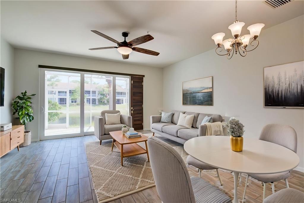 HURRICANE IMPACT WINDOWS – TANKLESS WATER HEATER – BRAND NEW CARPET & UPSTAIRS FLOORING – LAKE VIEWS! Welcome to this beautifully updated residence in Pinehurst at Stratford Place, offering a perfect combination of modern upgrades, low-maintenance living, and a prime central Naples location. This move-in-ready home features HURRICANE IMPACT WINDOWS for added protection, energy efficiency, and peace of mind. Recent improvements include BRAND NEW CARPET & UPSTAIRS FLOORING and a FRESHLY PAINTED INTERIOR, creating a bright, clean, and contemporary feel throughout. A TANKLESS WATER HEATER provides added convenience and energy efficiency for everyday living. The thoughtfully designed floor plan offers comfortable living spaces filled with natural light, while the private lanai overlooks peaceful LAKE VIEWS, providing the perfect setting to enjoy your morning coffee or unwind at the end of the day. Located in the gated community of Pinehurst at Stratford Place, residents enjoy beautifully maintained grounds, a community pool, and a low-maintenance lifestyle. Conveniently situated in the heart of Naples, you're just minutes from I-75, Mercato, Waterside Shops, world-class dining, shopping, healthcare facilities, and Naples' renowned white-sand beaches. Whether you're looking for a full-time residence, seasonal retreat, or investment opportunity, this home offers exceptional value in one of Naples' most desirable locations. THIS PROPERTY QUALIFIES FOR A 1% LENDER INCENTIVE IF USING PREFERRED LENDER, INQUIRE FOR MORE DETAILS** (Renderings that showcase furniture have been virtually staged)