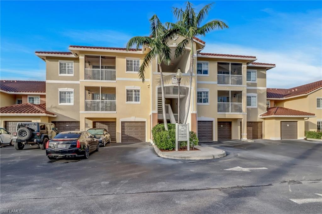 Welcome to this Exquisite 2-bedroom, 2-bathroom Condo Nestled in a Serene Community, offering the perfect combination of Luxury, Functionality, and Natural Beauty.  Beautiful Travertine Tile throughout the entire Condo.  The Master bedroom has a large walk-in closet with a private bathroom. The second bedroom is a unique en-suite, ideal for guests or a family member seeking extra comfort and privacy. The screened in Lanai is a relaxing space, where you can enjoy the beauty of the outdoors while staying shaded and comfortable. Step outside onto the paver patio and take in the breathtaking views of the tranquil lake and charming fountain. This unit also has its own detached 1 car oversized garage and a separate storage unit. The community offers several amenities which include a community pool, gym, Pickleball/Tennis and clubhouse. This Community is Minutes Away from Shopping, Restaurants and Entertainment.  Don't miss the opportunity to make this property your own. Schedule a viewing today and experience the beauty and tranquility for yourself.