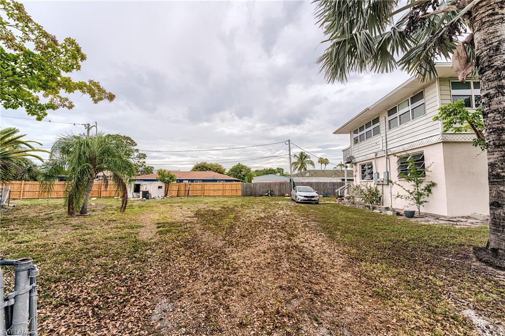 This duplex features two levels, with each unit offering 2 bedrooms, 1 bathroom, and an open-concept living room, dining area, and kitchen. Situated on an oversized lot, the property is just shy of meeting subdivision requirements but does allow for potential additions.

Located minutes from Fort Myers Beach and Sanibel.  Close to shopping.  Great Fort Myers location.

Newly renovated lower unit with new tile flooring throughout.  Ranges and refrigerators are included.

The house is elevated 3ft.  

The property is fully fenced, with the roof replaced in 2023 along with several updated windows. Both units are currently tenant-occupied, generating a total monthly rental income of $2,800.