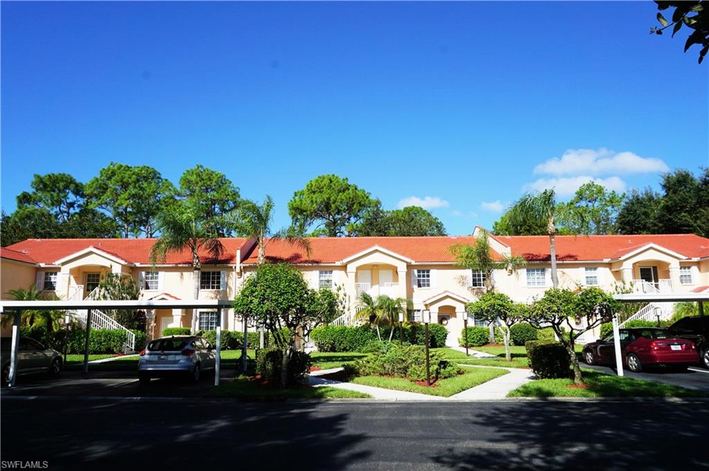 LOWEST PRICED UNIT IN LELY RESORT!!! Don't miss an opportunity to own a piece of paradise for under $200K. This MOVE IN READY second floor condo has been painted top to bottom in calming neutral colors along with new carpet. Entertain friends on the spacious screened lanai that overlooks the Flamingo Island Golf Course, one of Naples' signature golf courses. There is also an assigned car port space for one of your vehicles. Residents have a great community pool with spa and tennis/basketball court they can access just steps away! You are NOT required to have a mandatory club membership with this purchase however you can choose to join The Players Club & Spa, The Classics Golf Club or both should you desire. Lely Resort is situated on 3,000 acres and offers 3 championship golf courses, running/walking trails and gorgeous lakes and preserves. Whether this is your primary home or part time residence, you will feel like you are always on vacation in Lely Resort!