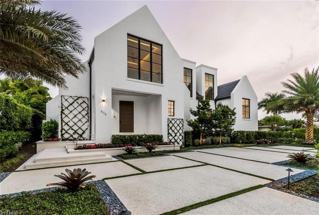 Highly desired Old Naples downtown location. This Custom residence is in the heart of Olde Naples. Designed by Harrell & Co Architects and Laura Hay Decor and Design, this breathtaking residence has southern exposure is located within walking distance to 3rd Street South and Naples renowned white sand beaches. Home features an open floor plan with modern design and decor and high-end finishes throughout such as custom cabinetry and millwork, Wolf and Subzero appliances, floor to ceiling glass, architectural ceiling detail, Moncer European oak floors throughout, Lurton lighting system, elevator, Lurton shades on all windows, temperature controlled wine room, whole house generator, natural gas and electric roll down screens and shutters. The inviting interior living space opens to a large outdoor living area complete with a summer kitchen, which overlooks the resort-style pool and spa and oversized sun/lounge area with artificial turf for sunbathing. This one-of-a-kind residence embraces the Naples lifestyle at its fullest and is steps from downtown Naples' world-class shopping, fine dining, and entertainment.