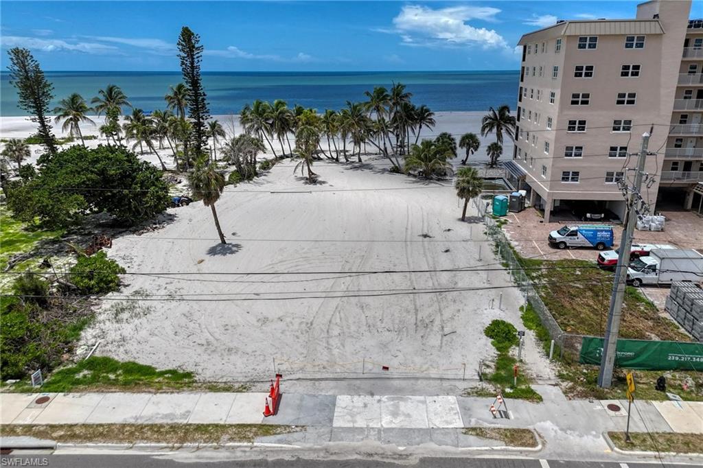 This is the BEST BEACHFRONT property on Fort Myers Beach with 100 Feet of Beach Frontage and many beautiful, mature, Palm Trees across the coastal line that frames your view to the beautiful Gulf.  You will have such spectacular SUNSETS for many fond memories as you lounge on the white sand in front of your future luxurious custom home.   Largest parcel for residential use for sale on Fort Myers Beach.  Please come visit and see for yourself.  This is an estate sized prime Beachfront property

This is at the quiet South End of the Island, a little South of Santini Plaza.