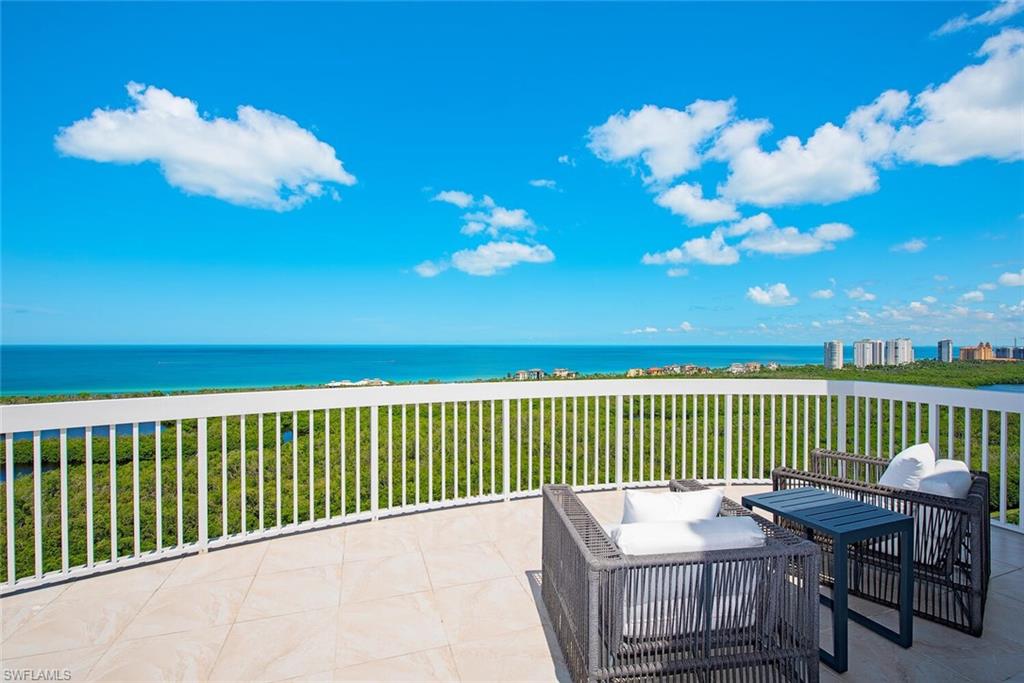 Perched on Top, with panoramic Gulf views, this rare St Raphael PENTHOUSE SEVENTEEN redefines coastal luxury. Encompassing 4750 square feet of exquisite interior living, this 4-BEDROOM + DEN sky-high residence touts unobstructed views stretching from SUNRISE to SUNSET, while blending refined elegance with effortless comfort. Enjoy direct elevator access to your own newly updated private PENTHOUSE floor hallway, leading to your own elegant double door entry. Step inside to be mesmerized by walls of glass opening to EXPANSIVE OPEN TERRACES offering a spectacular private stage to watch dolphins dance and sunsets melt into the horizon. Penthouse Seventeen includes a rare private air-conditioned poolside CABANA, THREE secure, deeded, under-tower parking spaces, and climate-controlled storage, conveniences rarely found together in high-rise living. A full complement of resort-style Tower amenities curated for carefree living include: A prized location just steps from the Pelican Bay walking, biking, and tram pathway to the beach, Olympic salt-water pool, fitness, social gathering and billiard rooms, and four luxuriously appointed guest suites. Enjoy included membership to all Pelican Bay’s community amenities: 2 private beach-front restaurants, attended beachfront service, community fitness and learning center, 18 Har-Tru tennis courts, pickleball, kayaking, biking, miles of walking/nature paths, and so much more. Artis Naples Performing Arts Center, Waterside Shops and Mercato also just minutes away!