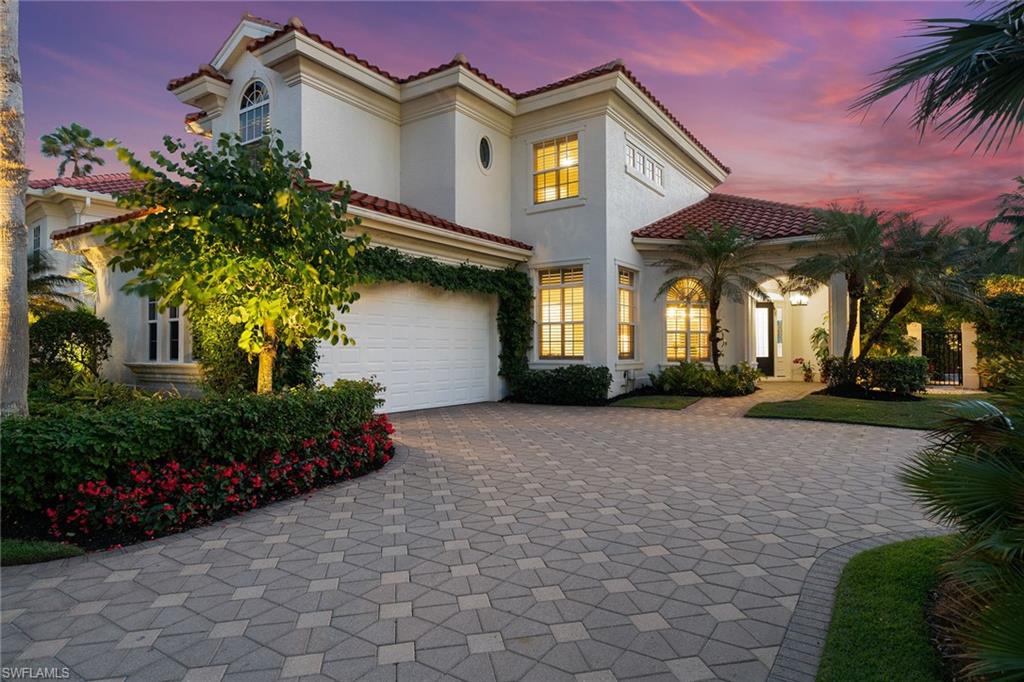 If you’re looking for a home that has been remodeled and is in new, move-in condition, this is it. All new wide plank white oak wood flooring on the ground floor and new Berber-like wool carpeting in the upstairs. Experience luxury living in Bay Colony, the most exclusive enclave in Pelican Bay. This stunning Villa La Palma home is situated on the neighborhood's most coveted lot, offering tranquil water feature views and vibrant birdlife. All the old copper pipes in the house have been replaced with the new Pex piping system. The chef's kitchen features Thermidor stainless appliances, induction cooktop, oven, microwave, warming oven, quartzite countertops, a center island, and elegant cabinetry. Natural light fills the home, offering versatile spaces ideal for a home office, family room, or quiet retreat. The primary suite is a private haven with a spa-like, newly renovated bathroom, dual quartzite vanities, 2 spacious walk-in closets, and custom marble mosaics. Guests will enjoy privacy and comfort in the spacious guest suites. Residents of Bay Colony enjoy exclusive access to the Bay Colony Beach Club, a new tennis center, and all Pelican Bay amenities, including pristine beaches and scenic trails. Ideally located just minutes from Mercato and Waterside Shops, this villa offers the perfect balance of luxury and convenience.
