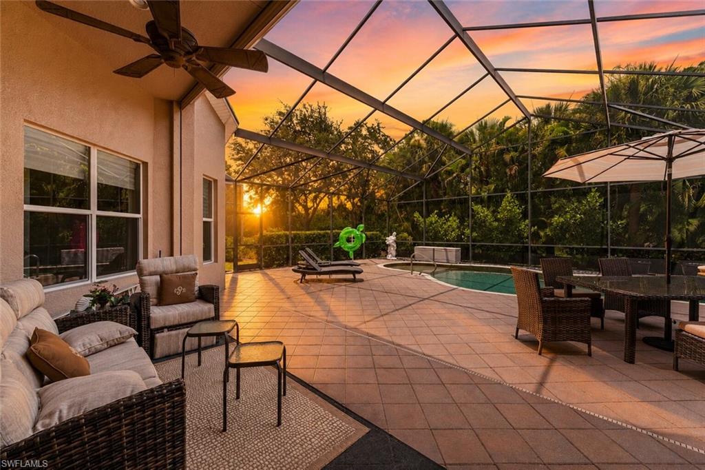 Positioned on a private preserve homesite within Belle Lago, this Toll Brothers-built Salerno model offers approximately 2,500 square feet with four bedrooms, three full baths, and one of the community's most sought-after floor plans. Thoughtfully designed for comfortable everyday living and entertaining, the home combines quality construction, storm protection, and exceptional indoor-outdoor living.

A covered entry opens to an inviting interior featuring porcelain tile installed on the diagonal throughout the main living areas, luxury vinyl plank flooring in the bedrooms, tray ceilings, crown molding, and abundant natural light. Wide sightlines extend from the foyer through the great room to the screened lanai and preserve beyond. The great room also features a built-in four-speaker surround sound system.

The open kitchen anchors the living space with rich wood cabinetry, granite countertops, stainless steel appliances, a natural gas cooktop, built-in wall ovens, and an expansive peninsula offering generous workspace, storage, and multiple seating areas. A signature seamless mitered glass breakfast window provides uninterrupted views of the lanai while filling the kitchen with natural light.

The private primary suite features a tray ceiling, elegant bay windows overlooking the lanai and preserve, dual walk-in closets, and an en-suite bath with dual vanities, a whirlpool soaking tub, and a separate walk-in shower. Three additional bedrooms and two full baths provide flexible space for guests, a home office, or hobbies.

The screened lanai serves as an extension of the living space with generous covered seating areas, a saltwater pool with an integrated sun shelf, a raised spa, and a peaceful preserve backdrop.

The home is equipped with protected window openings, motorized roll-down hurricane shutters enclosing the covered lanai and front entry, and a whole-house natural gas standby generator. Natural gas also supplies the kitchen cooktop.

The side-loading two-car garage features a painted floor, dedicated mini-split air conditioning system, and a window providing natural daylight, creating a comfortable climate-controlled workspace.

Residents of Belle Lago enjoy access to a clubhouse, resort-style pool, fitness center, tennis courts, pickleball courts, and an active social calendar. One of the community's most distinctive features is direct golf cart access to Estero Country Club at The Vines, allowing convenient access to golf, dining, and additional club amenities. Ideally located in the heart of Estero, Belle Lago is minutes from Coconut Point, Miromar Outlets, Southwest Florida International Airport, healthcare services, and Gulf Coast beaches.
