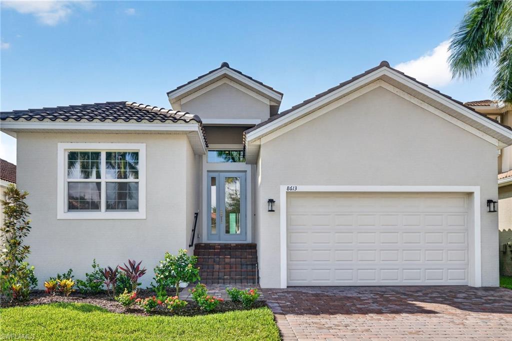 **** NEW CONSTRUCTION****This stunning new lakefront home in the highly sought-after Banyan Bay community is now complete and ready for immediate occupancy. Offering exceptional value, comparable new construction homes in the area are priced $40,000 or more higher. Perfectly positioned with desirable southern rear exposure, this beautifully designed home showcases tranquil lake views and abundant natural light throughout. Built with quality craftsmanship and modern finishes, the home features IMPACT WINDOWS AND DOORS, a corner sliding glass door leading to the lanai, white shaker style cabinetry, quartz countertops, elegant 8-foot interior doors and wood-plank porcelain tile flooring throughout. The backyard provides ample room for a custom pool, allowing you to create your own private outdoor retreat while enjoying peaceful waterfront surroundings. Ideally located near Sanibel Island, Fort Myers Beach, HealthPark Hospital, premier shopping, dining and entertainment destinations. Residents of Banyan Bay enjoy low HOA fees that include lawn-care, landscape maintenance, community pool access and gate maintenance. Best of all, there are NO CDD fees, helping keep ownership costs attractively low.