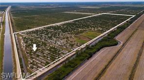8.25 acres of prime land in Gerber Groves. This mixed used lot has unlimited opportunities to grown your own crops and live on your own private farm. Property located in Gerber Groves Water District that is a managed entity funded through Hendry County Tax Collector. To visit the property enter 3rd Rd for GPS directions, 7th Rd is not recognized on all GPS devices continue north 4 blocks to 7th. Survey available.