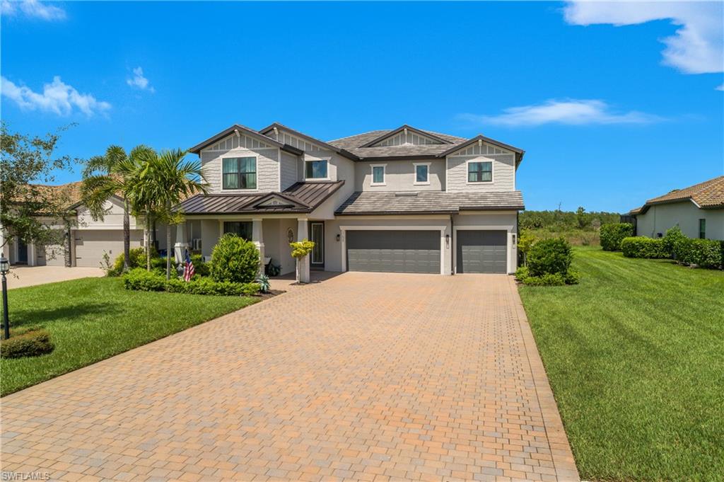 Welcome to the ultimate in Southwest Florida LUXURY LIVING —an extraordinary opportunity to own one of the most coveted floor plans in all of The Place at Corkscrew. This stunning Heatherton estate showcases the highly sought-after design featuring TWO PRIMARY SUITES, over 4,600 square feet of upgraded living space, and an incredible custom outdoor retreat that delivers the true Florida resort lifestyle. From the moment you arrive, the impressive curb appeal, charming front porch elevation, and oversized driveway accommodating up to 12 vehicles set the tone for what awaits inside. Designed for both grand entertaining and comfortable everyday living, this expansive residence offers 6 bedrooms, 5.5 bathrooms, and exceptional flexibility for multi-generational living, long-term guests, or growing families. The first-floor primary suite is a private retreat complete with a sitting area, creating the perfect sanctuary for homeowners or extended family. Inside, luxury upgrades are showcased throughout—from upgraded wood railings and designer tile flooring to custom finishes, central vacuum system, home alarm, Wi-Fi extenders, and a dramatic electric fireplace feature wall that anchors the main living space with warmth and sophistication. At the heart of the home is a chef-inspired gourmet kitchen designed to impress. Featuring an extended custom layout with additional cabinetry and countertop space, quartz surfaces, stainless steel appliances, vented microwave, oversized island with farmhouse sink, and abundant storage, this kitchen was built for entertaining on every level. Step outside and prepare to fall in love with your own private resort-style paradise. The spectacular heated saltwater pool and spa are surrounded by an oversized screened lanai with professional lighting, creating an unforgettable setting day or night. The expansive outdoor living space and fully equipped outdoor kitchen make this home ideal for hosting guests, sunset dinners, or relaxing while enjoying tranquil preserve views and complete privacy. Living in The Place at Corkscrew means every day feels like a vacation. Residents enjoy world-class amenities including a resort pool with a 100-foot waterslide, waterfalls, spa, full-service restaurant and bars, adult-only bourbon bar, café and marketplace, two-story fitness center, pickleball, tennis, bocce, basketball, dog park, playground, kids care center, and more—all just minutes from RSW International Airport, FGCU, premier shopping, dining, entertainment, and Southwest Florida’s breathtaking beaches.