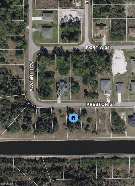 Canal front lot next to SR82 and Alabama. Electric pole at the curb with a paved. Next to new construction homes. Perfect for investors and builders.