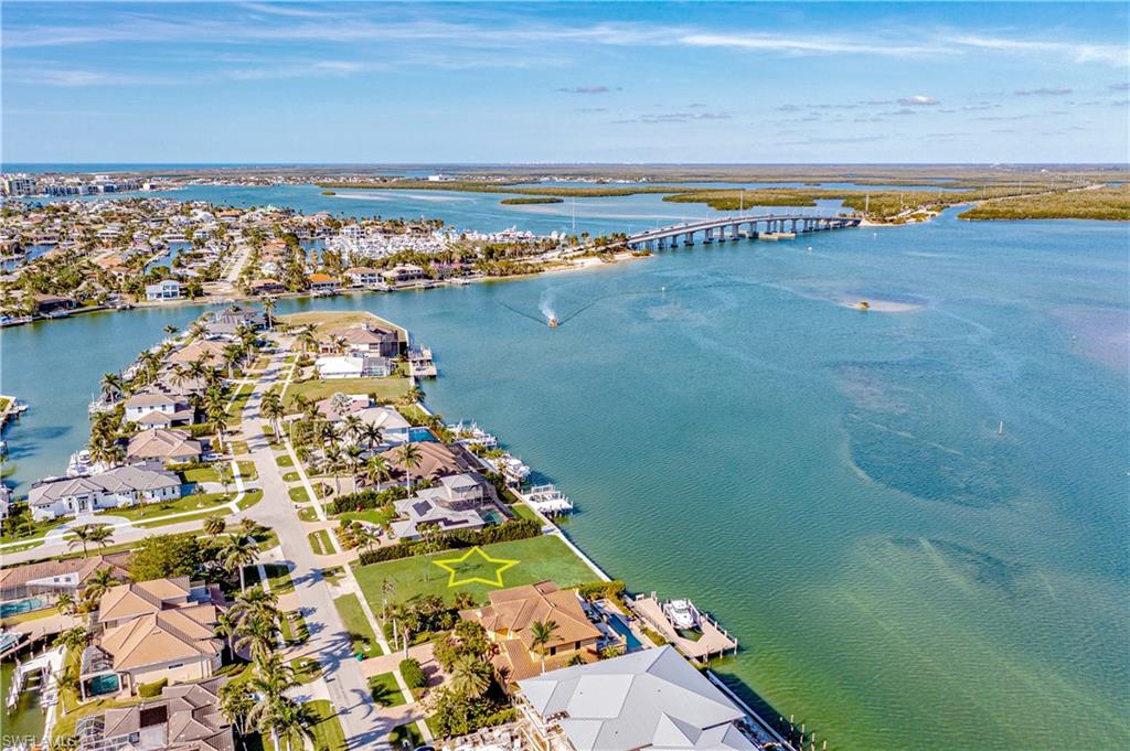 Located on one of Marco Island’s most desirable riverfront streets, this oversized waterfront homesite offers an opportunity to build in a proven setting. A brand-new seawall is already in place, allowing you to focus on design and construction. The views are expansive and unobstructed, extending across the Marco River to Sanctuary Sound and the Ten Thousand Islands.

Butterfield Court is a quiet, low-traffic street lined with newer luxury waterfront homes, offering privacy while remaining well positioned for daily conveniences. The location provides quick, convenient access to and from the island. For boaters, the access is exceptional, with easy routes for cruising, fishing, shelling, and Gulf access.

Oversized riverfront lots with open water views and a new seawall are increasingly limited on Marco Island. This is a straightforward opportunity to build a custom waterfront home in a location that retains long-term value.