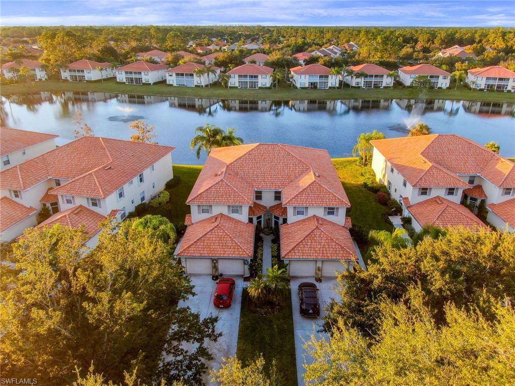 Prime Location!!! Welcome to Sherwood, one of the most desired communities in Naples Florida.  This wonderful second floor end-unit, vast lake view coach home, it  has been fully updated, and freshly painted. Features nearly 1,700 Sq. Ft of living space, plenty of natural light, vaulted ceilings, 2 large bedrooms, plus a large den, 2 Full bathrooms, 1 attached car garage with a long drive way. Updated  kitchen with newer stainless steel appliances, granite countertops,  back plash, newer light fixtures, newer laminating hardwood flooring, newer tile roof, updated bathrooms with granite, and much more. Spacious Master bedroom, large walk-in closet, step out through the sliders from the great room to the screened lanai with spectacular vast view of the lake. Sherwood features a clubhouse, tennis courts, basketball,  pet friendly,  walking/biking path, low HOA fees and less than 6 miles from downtown Naples & the pristine beaches, conveniently located near other favorite local shopping/dining destinations like Mercato, Tin City, short driving  distance to shopping including Starbucks, Publix, Walgreens, First Watch. Easy access to I-75.  It will not last!