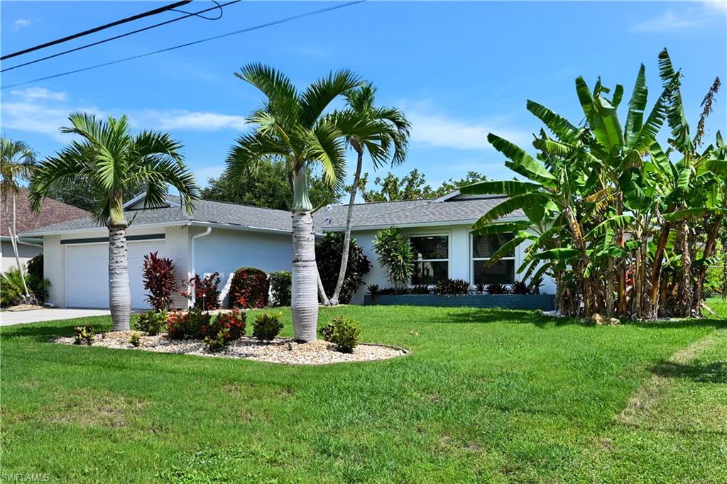 Beautifully renovated Pool home in one of the most sought after area's south of Cape Coral Pkwy.  Surrounded by Gulf Access Homes.  This Home features New Roof 2023, Pool & Spa 2014, Large open floor plan with Modern designed chefs kitchen.  Newer appliances, induction air fryer cooktop, island kitchen with Quartz Countertops, soft close cabinets pre wired for under cabinet LED lighting, and Liebeherr Refrigerator.  Laminate flooring as well as Seller has in storage 11or so impact glass windows not yet installed that will convey.  Close to Rotary Park, Rose Garden, Shopping and Entertainment.  Call today for a private showing.  Florida Living at its finest!
