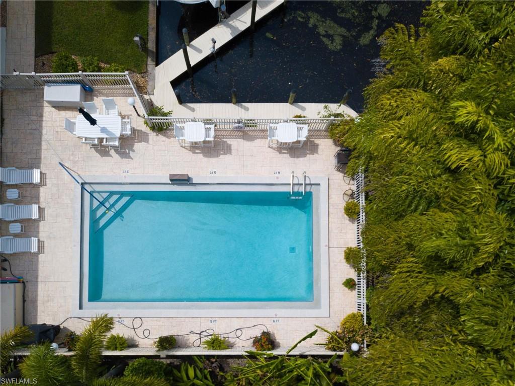 Amazing Location! Location! Location! Walk to Dinning, Churches, Grocery, Bars,  Almost Everything. Huge 3 bed, 3 bath. 1764 Sq. Ft. Townhouse. On the water, Direct Gulf Access, about 10 minutes to the river with 1 bridge under Del Prado Blvd. Beautiful western exposure with Amazing Sunsets from your balcony. 2016 AC. Heated Pool. 2 Masters, 1 on main floor 1 on 2nd floor. Priced To Sell, will not last.