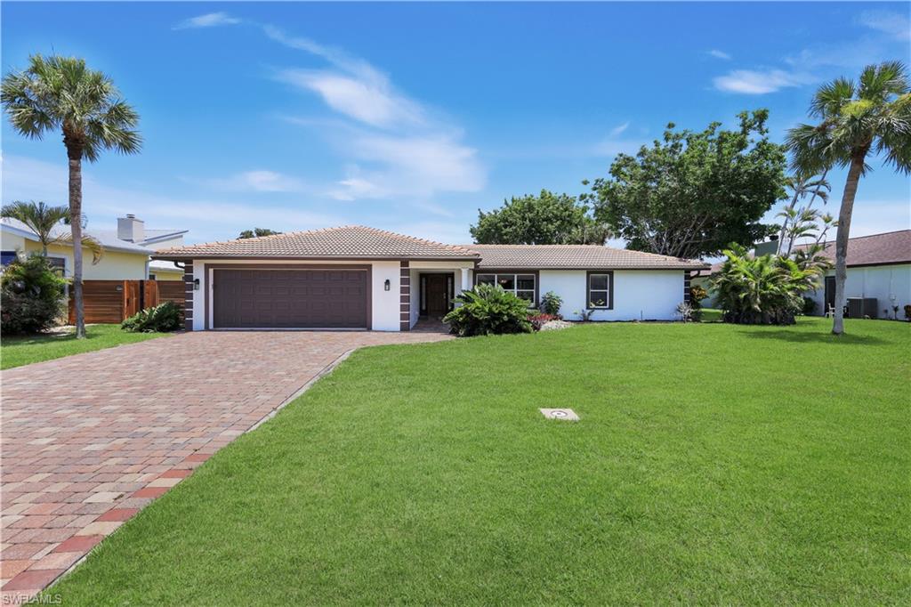 Whether you’re searching for a full-time family home, a seasonal Florida retreat, or an investment property with unlimited rental potential, this rarely available single-family pool home offers exceptional versatility and value.  This thoughtfully designed, three bedroom, two bathroom home features an inviting floor plan where the living room, family room, two dining areas (dining room and dining nook with wet bar) and kitchen flow seamlessly together, creating the ideal space for both everyday living and entertaining.  A wall of sliding glass doors fills the home with natural light and opens via the family room or living room to a spacious screened lanai with a sparkling pool, overlooking a private, tropical backyard—perfect for enjoying Southwest Florida’s indoor-outdoor lifestyle. The kitchen features granite countertops, wood cabinetry, stainless steel appliances and is adjacent to both the family room and living room.  The split bedroom configuration provides privacy for owners and guests; the primary bedroom has an en-suite bathroom and the two guest bedrooms share a full bath -  making the layout ideal for families, visiting friends, or seasonal residents.  The home is move-in ready with fresh interior and exterior paint and a newer garage door.

Located in the highly desirable Palm River area served by top-rated schools, this home appeals to families seeking an excellent educational environment, seasonal homeowners looking for a low-maintenance Florida getaway with no HOA obligations, and investors seeking maximum flexibility with no rental restrictions. Enjoy the freedom of homeownership without HOA fees, rental limitations, or unnecessary rules—an increasingly rare find in today’s Naples market.