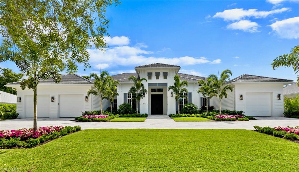 H.15602 Spectacular NEW home that pairs timeless, elegant design with the highest quality construction. Built by Dillman Construction, one of Naples premier luxury builders, the exceptional property offers the perfect balance of casual & elegant living. This stunning home is located on a large .41acre lot in the heart of Coquina Sands on stately Crayton Road, & is a short walking distance to the beach. Wide plank European oak floors, extensive moldings, & custom woodwork combined with an open floor plan w/separate dining area & den, provide great entertaining & set this home apart. Gorgeous outdoor area, with tranquil water fountains, lap pool & spa with sun shelf, full outdoor kitchen & linear fireplace.  Inside, the spacious kitchen features custom cabinetry, quartz counter-tops, Sub Zero & Wolf appliances, hidden walk-in pantry, &  two islands. Serene master suite w/ elegant marble finishes & custom fittings in the spa-like bathroom. A further 3 bedrooms all with en-suite baths, round out the floor plan. Beautifully landscaped & spacious private grounds provide lovely views from every room. The perfect combination of style, finishes and location.