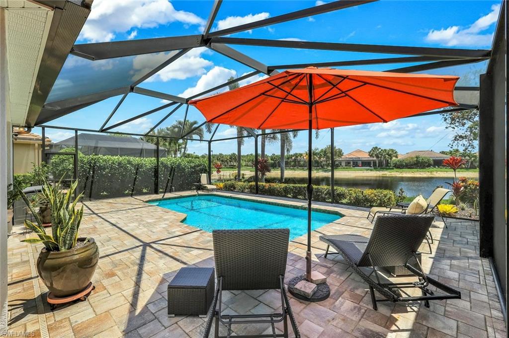 Welcome to Paradise! This spacious "Vanderbilt" 3+ den/office, 2 bath home in the Quarry offers split bedroom layout, open living area floor plan with an eat-in kitchen and much more. This move in ready residence features a newly renovated primary bathroom with a stunning walk-in shower and a custom California Closet system.  Interior upgrades include crown molding, fresh paint inside and out, and new luxury vinyl flooring in all bedrooms.   The kitchen boasts upgraded cabinetry and stainless-steel appliances perfect for both everyday living and entertaining.  Step outside to your private oasis with a saltwater pool on an extended lanai overlooking tranquil water views with ideal southern exposure. Additional highlights include impact windows throughout and an insulated garage with epoxy flooring for a clean, finished look.   The Quarry is one of Naples’ most distinctive lakefront communities, built around the crystal-clear waters of Stone Lake. Residents enjoy a true resort lifestyle with a private beach club, resort-style pool, an indoor/outdoor restaurant and tiki bar perfect for everything from sunset cocktails to casual waterfront dining. An active, social atmosphere is anchored by a full-service wellness center, five Har-Tru tennis courts, five pickleball courts, and bocce, all supported by a full-time activities director curating events, leagues, and gatherings year-round. Stone Lake sets The Quarry apart, offering rare opportunities to boat, jet ski, paddleboard, kayak, and fish right in your own backyard—something few Naples communities can claim. In addition, optional golf memberships are offered at the privately owned Quarry Golf Club. Designed by world-renowned architectural team of Dr. Michael Hurdzan and Dana Fry in 2007, this Par 72 championship golf course offers an exceptional golf experience with spectacular views. Whether you’re seeking relaxation, recreation, or a vibrant social calendar, The Quarry delivers a one-of-a-kind lakefront lifestyle that feels like a permanent vacation.