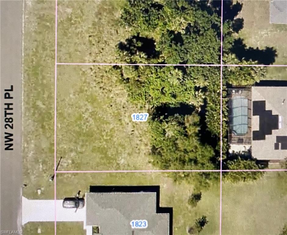 Nice lot in a quiet neighborhood, a place to call your future home. Yards away from the entryway to beautiful Coral Oaks Golf Course. Permit for a single family dwelling available.