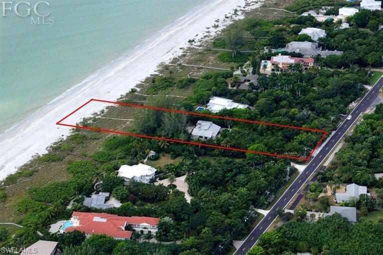 PRESTIGIOUS  WEST GULF DRIVE ! A magical rarely property available for purchase. Owner has built this contemporary home on prime site on 2.11 acres, directly on the Gulf of Mexico. This incredible beach front home features a lovely well cared  3 bedroom/ 3 bath + a private office with built in book shelves and lots of storage. This Island style home has cathedral ceilings and wooden decks surrounding the building. Walking path to the beach for awe inspiring water & sunset views. This home insures ultimate privacy and is a sensational lifestyle experience on the beaches of Sanibel Island.  Taxes reflect homestead rate !