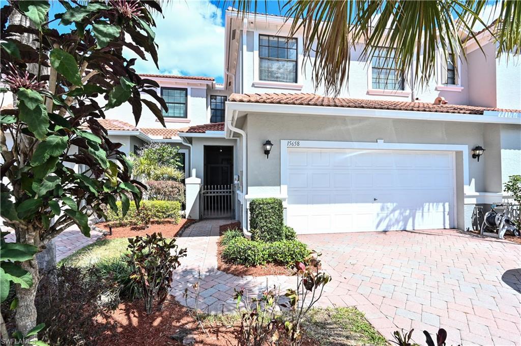 AWESOME LAKE VIEWS and MOVE IN READY! This meticulously kept spacious townhouse that boasts over 2000 sq ft. is located in the popular pet friendly gated community of Summit Place. The 4 Bedroom- 2.5 Bath, 2 Car Garage townhome feels like a single-family home with its private screened entry.  Large great room with sliders that lead to the oversized lanai that overlooks a Lake/ landscaped area, large eat in kitchen with stainless steel appliances, new Tile floors, and A/C. Master Suite features a huge walk-in closet and Dual Sinks.   LOW HOA FEES include Fiber optic cable and internet, Landscaping, Manned Gatehouse. The clubhouse offers a resort style pool, hot tub, sauna, tennis and basketball courts, gym, and playground. Summit Place is conveniently located off the rapidly growing Collier Blvd in close proximity to all the new restaurants and shopping Naples has to offer.