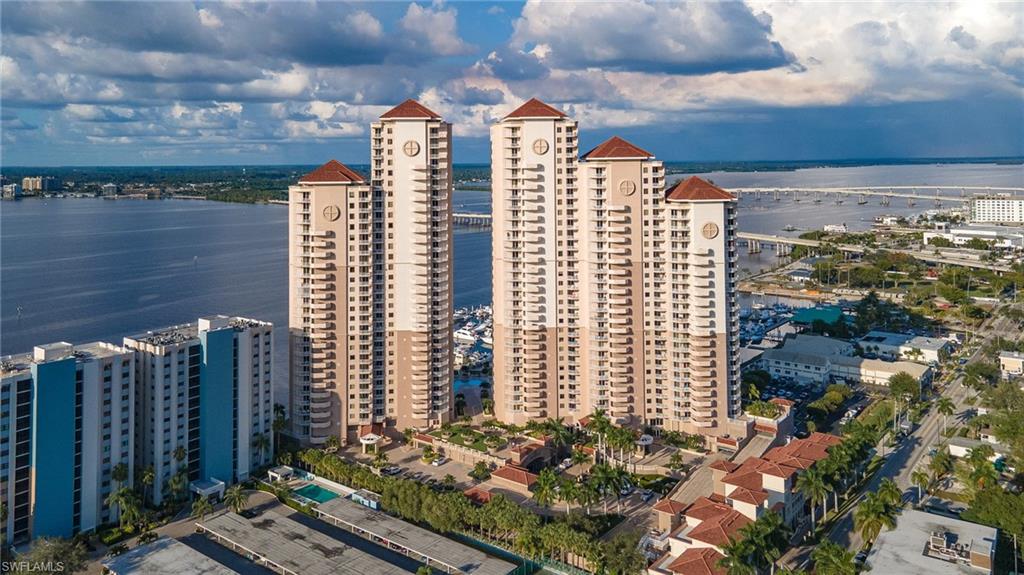 $$$MILLION DOLLAR VIEW! From this 7th Floor Condo you will enjoy long views of the Caloosahatchee River, Cleveland Avenue Bridge and a Beautiful Evening Sunset.  A lot of nice upgrades with Plantation Shutters, large gourmet style kitchen, hurricane rated doors and windows.  The Master Bath has a separate Shower and Tub and duel sinks.  The Jack and Jill style Guest Bedrooms offers nice privacy for guests. And what a view from the covered and screened Lanai that overlooks the River and Pool and Spa area.  Tile throughout with ceiling fans in the bedrooms, den, living area and Lanai. A great location and short walk to the Ft. Meyers Historic District where you will find shopping, dining and great entertainment. The Historic District has many Special and Seasonal Event to enjoy. The amenities in High Point include a well equipped Fitness Center, BBQ Grills, Pool and Hot Tub and a great Community Room with a Kitchen available for special occasions. Make your appointment soon, will not last long.