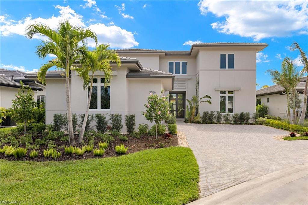 INCREDIBLE OPPORTUNITY! Are you looking for a beautiful NEW home in the much sought after North Naples area that is standing strong & dry through Hurricane Helene & Hurricane Milton? WISH GRANTED! Literally, ZERO damage through two major Hurricanes! MOVE IN to a world where style, sophistication & elegance seamlessly blend w/ cutting-edge smart home technology. This stunning residence redefines modern living w/ a fusion of timeless design & intelligent innovation. Thoughtfully curated spaces adorned w/exquisite finishes create a home that exudes class & embraces smart living. The 5-bed/5-bath masterpiece spans over 5200 sq ft, featuring elegant open-concept living, tray ceilings, & recessed lighting. The heart of the home is the gourmet chef’s kitchen equipped w/ NATURAL GAS & Wolf appliances, quartz countertops, stone backsplash, pendant lighting, engineered wood flooring, touchless faucets, 3-system HVAC (2 w/ dehumidifiers), central vac, WHOLE HOUSE GENERATOR, EV charger, saltwater pool, spa, outdoor kitchen, firepit, & beautiful landscaping w/ lighting & border stones. Home is pre-wired for motorized blinds, temperature, security & entertainment with just a touch, integrating the latest in home automation seamlessly into your daily routine. This home is not just a haven of style; it’s a statement of prestige & discernment & all in Moments from Vanderbilt Beach. Come live exceptionally