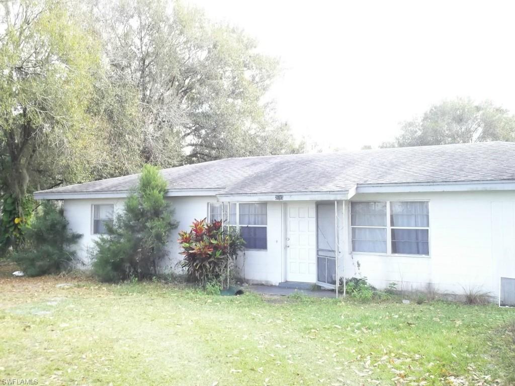 Country living  with approximately 30.5 acres on Prairie Creek.   Property has wooded and cleared areas as well as an existing 2 bedroom, 1 bath home that could be occupied or build a new country estate.