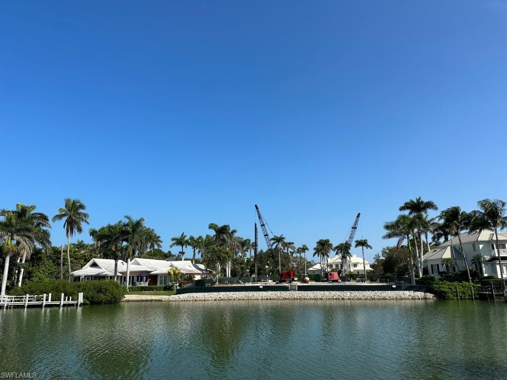 Build your dream home on this incredible Port Royal building site located on Admiralty Parade. This highly sought after property measures 188 feet of depth, with 122 feet on the water totaling just under 23,000 square feet. This cleared building site will accommodate a spacious custom built home of over 6200 square feet under air. Architectural renderings show the possibility of  a home with 5 bedrooms, 5 and 1/2 bathrooms, den, office, 4 car garage, pool, spa and large outdoor living space.  In addition, this home site is eligible for a Port Royal Club Membership. The Port Royal club offers first class amenities including a fitness center, spa, tennis courts, fine dining, and private beach access.
