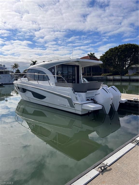 49’ LOA Floating Bellingham docks Concrete LIVEABOARD Dock Awaits! Deeded Liveaboard with 50 amp shore power, water hook up and pump out connection right at slip. WiFi throughout marina —
Located inside the T-head with the widest dock finger you’ll experience the ultimate blend of comfort, security, and coastal freedom with this 49' LOA (18.5’ beam) floating concrete liveaboard boat dock located in a protected basin at beautiful Marco Island Marina. This premium stern-in Starboard tie slip offers easy, direct access to the Gulf of America and Cockpit Sunset Views —perfect for boaters who want both serenity and adventure at their doorstep.  
 Premium Marina Lifestyle
Set within one of SW Florida’s most sought-after marinas, you’ll enjoy full resort-style amenities, including:
Clubhouse / Captain's Lounge
Sparkling Pool & Sun Deck
Barbecue & Picnic Areas
Modern Restrooms with Showers
Onsite Laundry Facilities
Ice for Your Voyages
Conference Room & Pool Table
Fully Equipped Gym
Private Mailboxes
Clubhouse Kitchen
Onsite Dockmaster for Assistance & Security PLUS coordinated Marina events!
Everything you need is right here—comfort, convenience, community, and world-class boating.
 
Why This Floating Concrete Liveaboard Dock? 
• Ideal for full-time living or seasonal escape
• Prime location close to shopping, dining, and white-sand beaches
• Peaceful, protected basin with calm waters
• Quick access to the Gulf for fishing, cruising, or sunset sailing
•        Boat Lift can be installed with Board application/approval
•        Very secure and storm safe with extended pilings
Live the Lifestyle You’ve Always Wanted! Whether you’re seeking a waterfront home base, a luxurious long-term slip, or a peaceful retreat steps from the Gulf, this slip brings it all together.
Investor Alert!!! Available 1 year lease back @ $1400/mo, with 2nd year option, to guarantee immediate income! Ready to make every day a boating day? Call today!