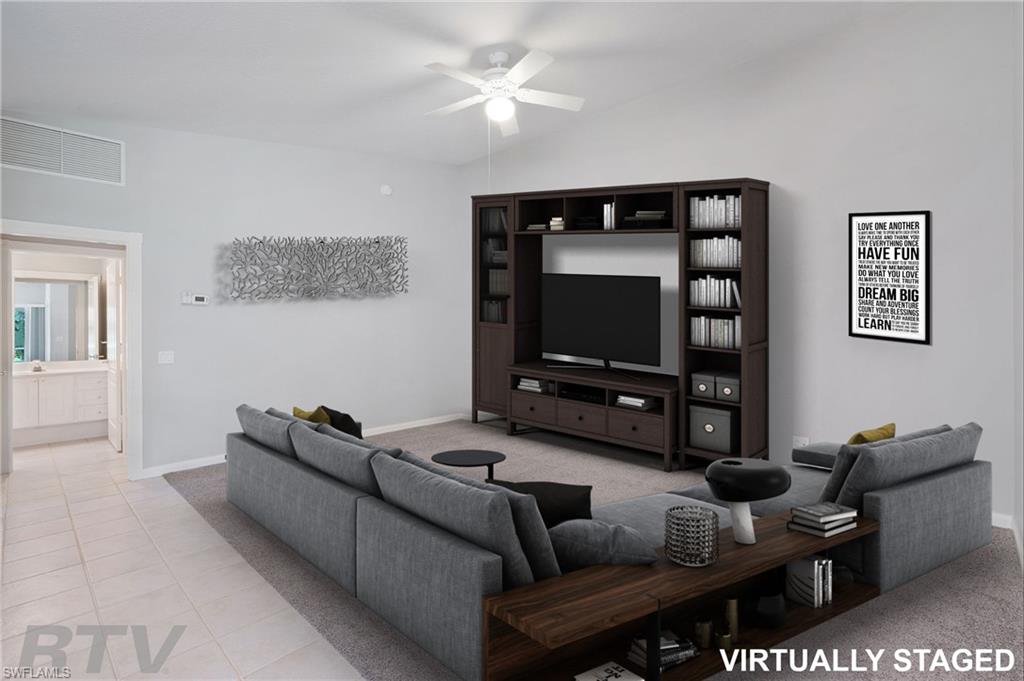 This villa has been meticulously maintained. Light and bright, spacious and freshly painted, the carpet has just been steam cleaned and look new!  Enjoy the tranquility of the beautiful lake view from the large screened lanai. Entertaining is a breeze in this open floor plan with large kitchen featuring newer appliances and plenty of cabinets. The 2 large bedrooms have custom shelved walk-in-closets. The laundry room has a sink, cabinets and plenty of storage space and leads out to the 2 car garage. Village walk has many year round amenities, including 2 heated pools, tennis and bocce ball courts, a fitness center, library, hair salon and restaurant. Off of Vanderbilt Beach, you are within close proximity to shopping, dining and beautiful beaches.