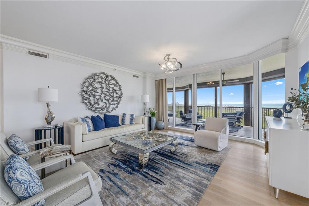 Go into this immaculate high-floor Toscana residence through your private elevator foyer. Enjoy soaring Gulf and preserve bay views through floor-to-ceiling sliding glass doors or from an oversized wrap-around outdoor lanai. A second lanai to be enjoyed by family and guests with sweeping sunrise views. Designer features include wide plank white oak wood floors, white marble countertops, stainless GE Monogram appliance package, sleek Siematic cabinetry, elegant crown molding, designer lighting and trim, spacious walk-in closet, primary bath with dual sinks, jetted tub, separate shower and tons of natural light. Bay Colony residents enjoy the benefits of the private Bay Colony Beach Club and newly renovated Bay Colony tennis facility.