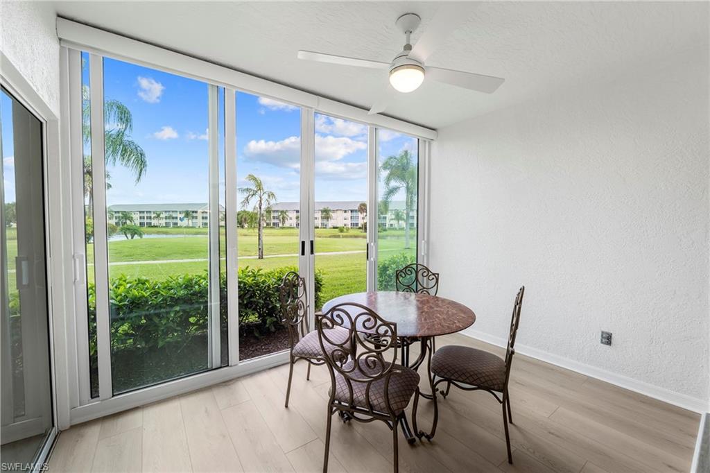 Within the gated community of Breckenridge, this desirable first-floor residence offers bundled golf and an active resort-style lifestyle in the heart of Estero. The two-bedroom, two-bath home combines updated interior finishes, functional living spaces and scenic golf course and lake views in one of Southwest Florida’s convenient locations. Inside, the residence features new flooring installed in 2026, renovated kitchen and baths completed in 2023, new appliances installed in 2023, quartz countertops, and impact glass windows and doors for added protection and efficiency. The open living and dining areas are designed for comfortable everyday living and entertaining, while large windows and sliding glass doors allow natural light to fill the space and highlight the peaceful surrounding views. One of the home’s standout features is the enclosed lanai, which has been converted into additional air-conditioned living space and features remote-controlled blinds, creating a larger interior footprint and offering flexibility for a sitting room, office or extended entertaining area. Overlooking the golf course and lake, the residence provides a relaxing setting with desirable Southwest Florida scenery. The primary suite includes a generous walk-in closet and a well-appointed bath with ample storage and functionality. The guest bedroom and additional bath provide comfortable accommodations for visitors or seasonal residents. Additional updates include a new water heater installed in May 2022 and a new air-conditioning system installed in May 2026. The residence also includes a covered parking space along with ample guest parking nearby for added convenience. Breckenridge residents enjoy access to bundled golf, tennis courts, pickleball, a resort-style pool, clubhouse, and a full calendar of social activities and amenities. Ideally in the heart of Estero, this residence offers easy access to Southwest Florida International Airport, Coconut Point Mall, Miromar Outlets, Gulf beaches, dining and entertainment throughout Southwest Florida.