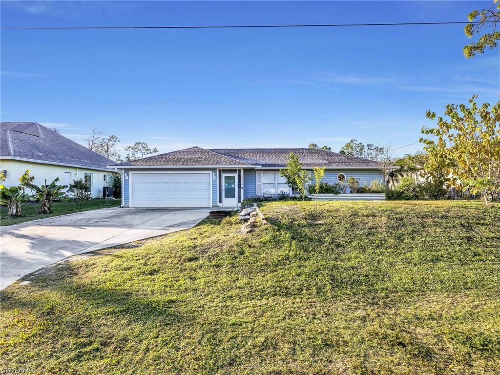 RARE OPPORTUNITY! Southern exposure pool home in a NO FLOOD ZONE with NO HOA and a producing tropical fruit orchard! This is not your typical Bonita Springs property. Enjoy the freedom of homeownership without HOA fees or restrictions while harvesting fresh fruit from your own backyard, including mango, banana, avocado, starfruit, mulberry, citrus, soursop and more. This desirable 3-bedroom plus den, 2-bath home offers a spacious layout and a beautifully updated chef’s kitchen featuring an oversized island, abundant cabinetry, a WiFi-enabled double oven, and induction cooktop (both upgraded in 2026)—perfect for everyday living and entertaining. Major updates provide peace of mind, including a 2023 roof, complete PEX plumbing, new attic insulation and ductwork (2025), a resurfaced pool with expanded concrete deck (2026), and a storage building added in 2024. Move in and enjoy immediately while adding your own personal touches over time. Bonita Elementary, Bonita Middle, Bonita Charter, and Bonita Springs High School are all within 3 miles of this beautiful home!