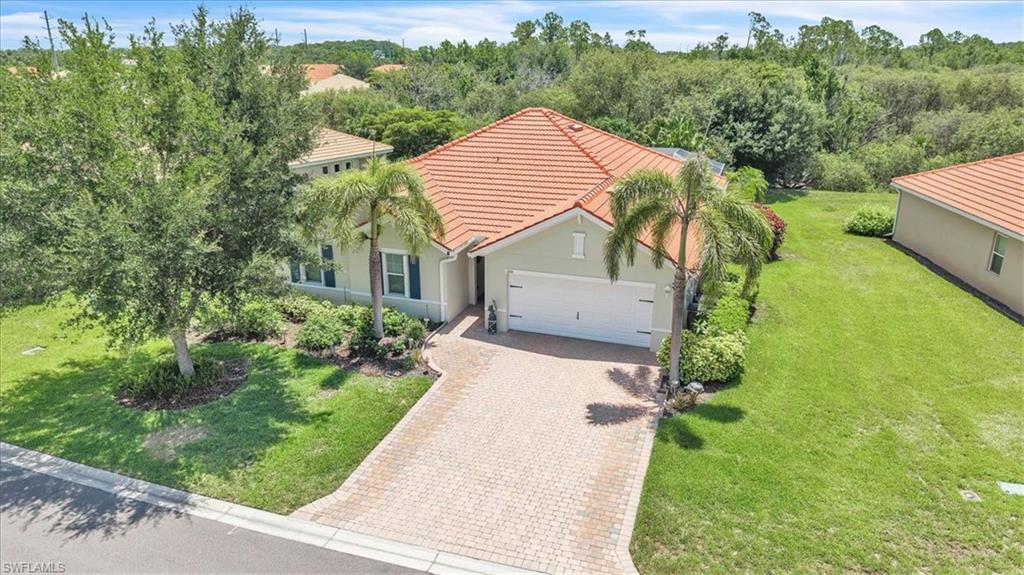 Why wait to build when you can move right into a home that’s already been loved, upgraded, and practically wrapped in bubble wrap for you? Welcome to 3216 Birch Tree Ln, tucked away on a quiet street in the premier gated 55+ active-adult community of Cascades. Built in 2016, this isn’t a cookie-cutter floor plan. While most homes here offer 3 bedrooms and a den, this one has 4 true bedrooms and 2 full baths across 2,090 sf of beautifully maintained living space. Finally, a home where you can host the family for the holidays without having to convert your office into a makeshift bedroom or blow up an air mattress! Speaking of the bedroom/office, there are no photos of this room but you can see it on the floor plan. And the sellers are handing over $750 at closing to replace the carpeting in that room. You're welcome! Step out back and prepare to relax. The owners have poured over $123,000 in premium post-build upgrades into this property. You get a private, landscaped preserve lot with perfect eastern exposure, meaning gorgeous morning sunrises and absolutely no baking in the brutal, hot western afternoon sun. The backyard is a full-blown private resort featuring a heated saltwater pool, integrated spa and extended 1200 sf screened pool deck and cage ($65k, 2018) all surrounded by lush, custom upgraded landscaping ($15k). Storm season anxiety? Not here. This home is a fortress. Lower your motorized Storm Smart hurricane screen ($5k), over the lanai with the touch of a button, slide shut your high-wind accordion shutters on all the windows ($4k, 2025), and rest easy knowing a heavy-duty Generac 17,500-watt portable generator could stay with the house and is hard-wired right into your panel ($6.5k total, 2023). Power outage? A minor inconvenience. Inside, you'll love the extended kitchen cabinetry, travertine marble backsplash and beautifully remodeled bathrooms ($15k, 2021). Newer carpeting ($2.5k, 2024) and modern interior can lighting is already installed ($1k, 2024). Even the exterior got a glow-up with a widened paver driveway for easier and extra parking ($3.4k, 2023) and fresh exterior paint ($6k, 2025).This home is perfect for full-time residents or seasonal snowbirds. Because the HOA handles all your lawn care, cable, internet, and gate security, this is the ultimate "lock-and-leave" property. You can pack your bags, head out to nearby Fort Myers, the Gulf beaches, or catch a flight out of RSW or Punta  Gorda airports, knowing everything at home is completely taken care of. Best of all, your HOA fees score you amenity privileges at the private 5,000-sq-ft Cascades Amenity Center where you can relax in the resort style pool, play pickleball, tennis, or bocce. This home comes mostly furnished, is heavily upgraded, and ready for you to live your best Florida life. Schedule a tour before someone else beats you to it!