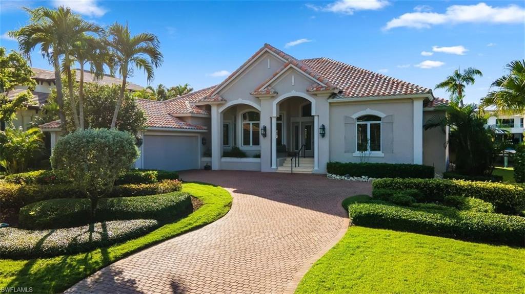 This seldom available and highly sought after western exposure home in Aqualane Shores is the newest offering in this amazing neighborhood! Located on 7th Street South, this lovely three bedroom plus den, three and a half bath home awaits! This is your opportunity for magnificent sunsets and gorgeous afternoon sun,  the canvas for the Naples Luxury lifestyle that is Aqualane Shores. Offering over 3300 square feet of living space and generous screened pool area! This property is a boaters paradise with a 13,500 lb. boat lift in your backyard, direct gulf access to the Gulf of Mexico and walking distance to the sugar sand beaches, and all the offerings of Third Street shopping and dining! Some photos have been virtually staged by Wanderlust Photography, LLC.