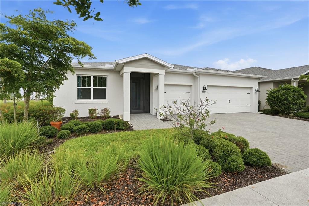 Welcome to 16120 Lotus Way, located in the highly sought-after Lake Babcock neighborhood of Babcock Ranch! This beautifully maintained 3-bedroom + den, 2.5-bath home with a highly desirable 3-car garage offers 2,190 square feet of thoughtfully designed living space on a spacious corner lot.

Step inside and you'll immediately appreciate the open-concept floor plan, designed for both everyday living and entertaining. The gorgeous kitchen serves as the heart of the home, featuring a tile backsplash, upgraded cabinet hardware, custom window treatments, and seamless flow into the dining and living areas. Large plank tile flooring extends throughout the main living areas and hallways, while ceiling fans throughout the home provide year-round comfort.

The versatile den offers the perfect space for a home office, playroom, fitness room, or guest retreat. A generously sized laundry room includes a convenient mop sink and additional storage space.

Outside, you'll find an oversized screened lanai overlooking the expansive corner lot, providing plenty of room to relax, entertain, or create your dream outdoor oasis. Additional upgrades include a screened front entry, upgraded glass front door insert, custom slider treatment, added garage storage shelving, and numerous thoughtful touches throughout.

Location is everything, and this home delivers. Just minutes from the community pool, sports courts, playgrounds, and Founder’s Square, you'll enjoy easy access to farmers markets, holiday celebrations, live music, food trucks, and community events throughout the year.

Convenience is right outside your door with nearby schools, shopping, dining, County Road 31, police, fire and EMS services, urgent care, the future hospital campus, Starbucks, Panera Bread, Five Guys, Carvel Ice Cream, Ulta Beauty, Marshalls, HomeGoods, Ace Hardware, Publix, and so much more.

Combining a desirable open-concept floor plan, thoughtful upgrades, a spacious corner lot, and an unbeatable location, this home offers an exceptional opportunity to enjoy everything this vibrant community has to offer. Schedule your private showing today and experience the Babcock Ranch lifestyle for yourself!