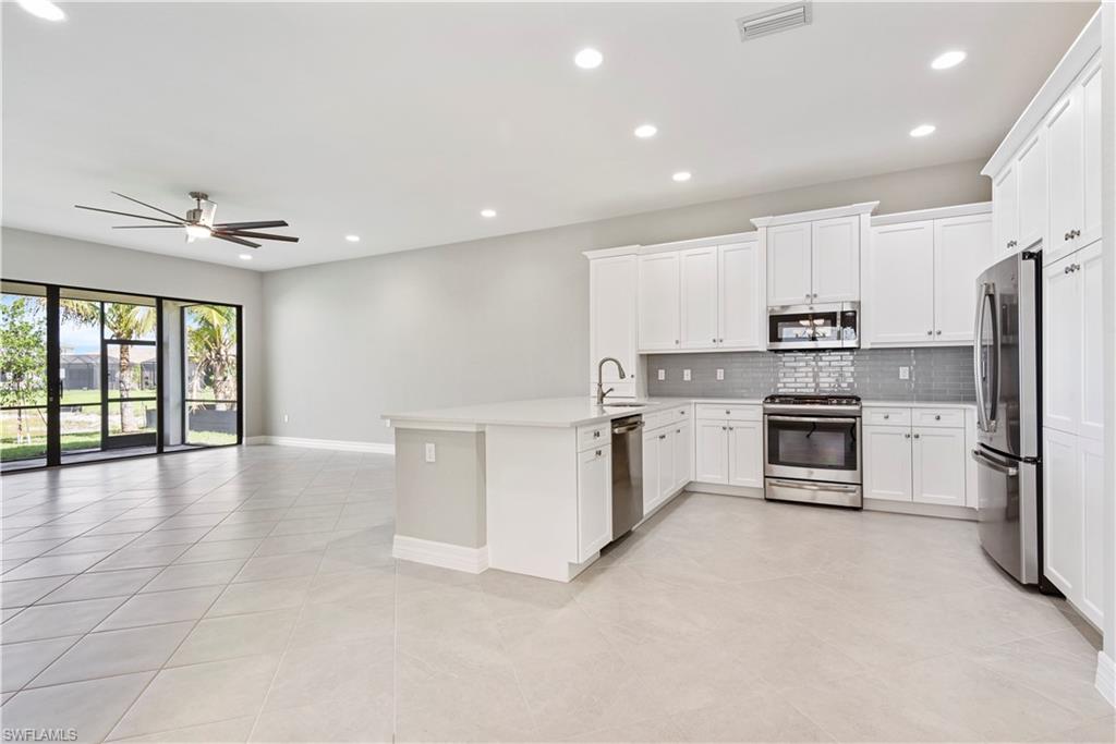 New Construction - Move-In Ready! This lakefront single family home offers a Tribeca floor plan with over 2,200sf of under air living space, 3 bedrooms+den, 2 1/2 bathrooms, gourmet kitchen with open concept design, spacious master bedroom with a luxurious master bath (dual sinks, step in shower, roman tub, & two generous walk-in closets), a formal dining room, volume & tray ceilings, and screened rear lanai w/ a lake view. Stonecreek features resort-style amenities including an indoor & outdoor basketball court, fitness center, pool, lap pool, water play area, party pavilion, tennis courts, beach volleyball and pickleball courts.